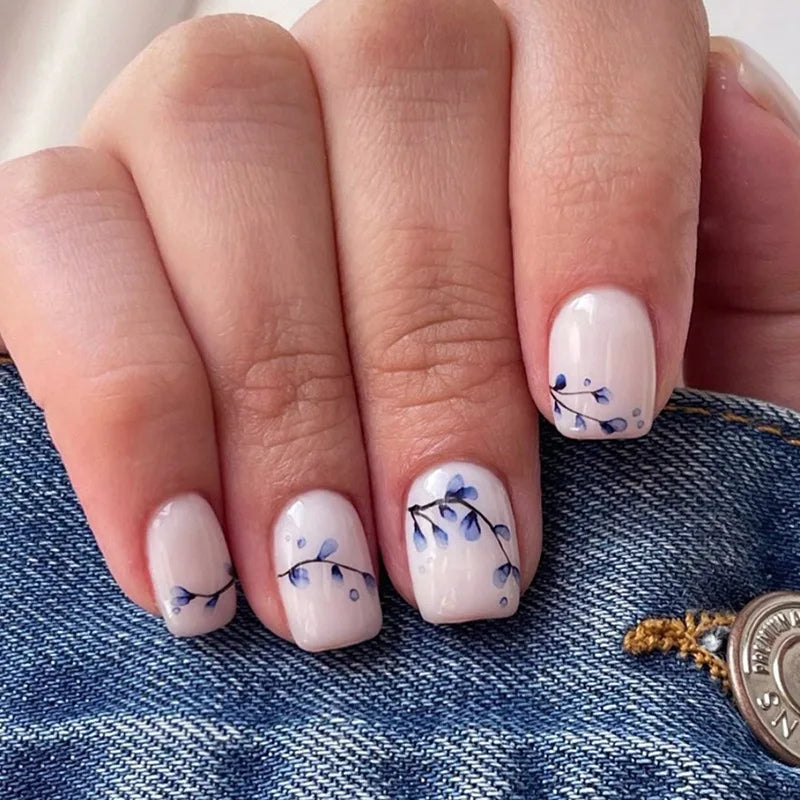 Sheer Pink Nails With Blue Floral Sprigs