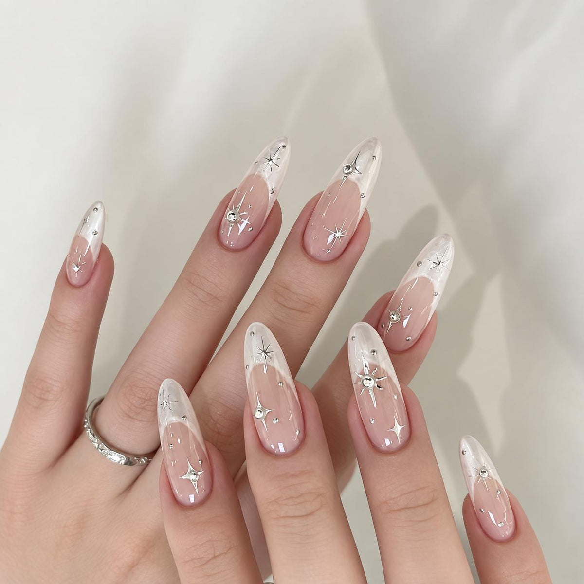 Sheer Pink Nude Celestial Starburst Press-On Nails with White Tips and Silver Accents