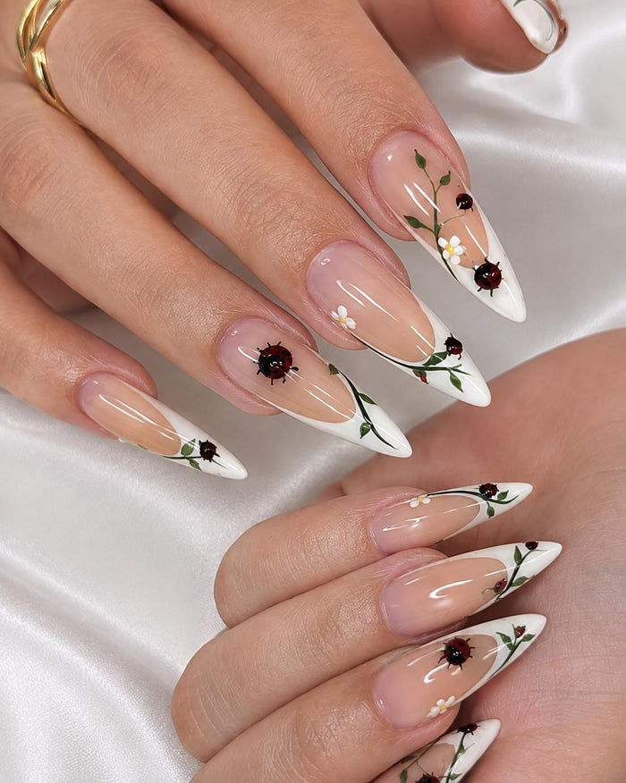 White French Tip Press On Nails With Floral Stems And Ladybug Details