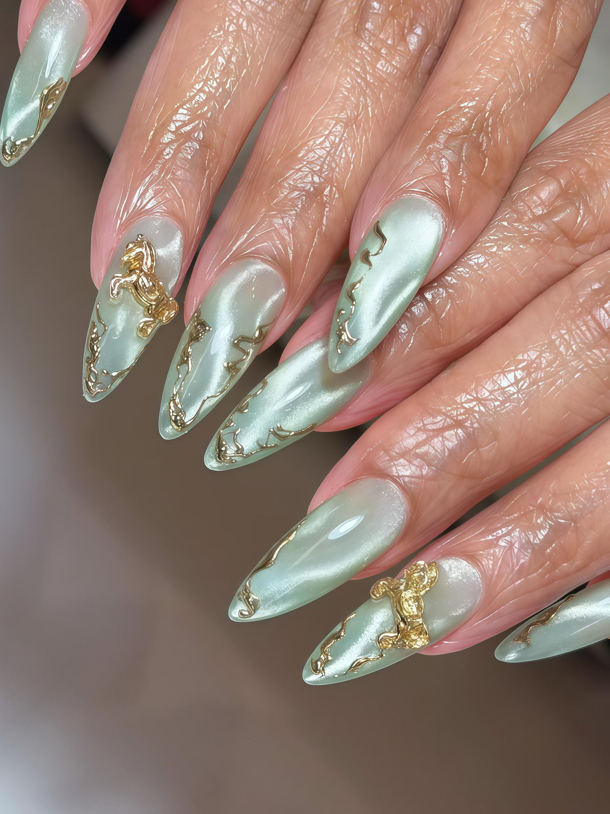 Shimmery Mint Green Nails with Gold Foil and 3D Angel Charms