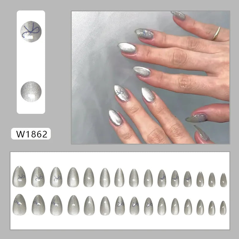 Silver Chrome Cat-Eye Nails with Bow Motifs