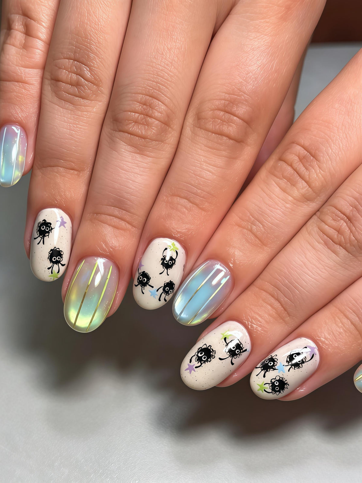 Soot Sprite Press-On Nails With Iridescent Chrome and Painted Stars