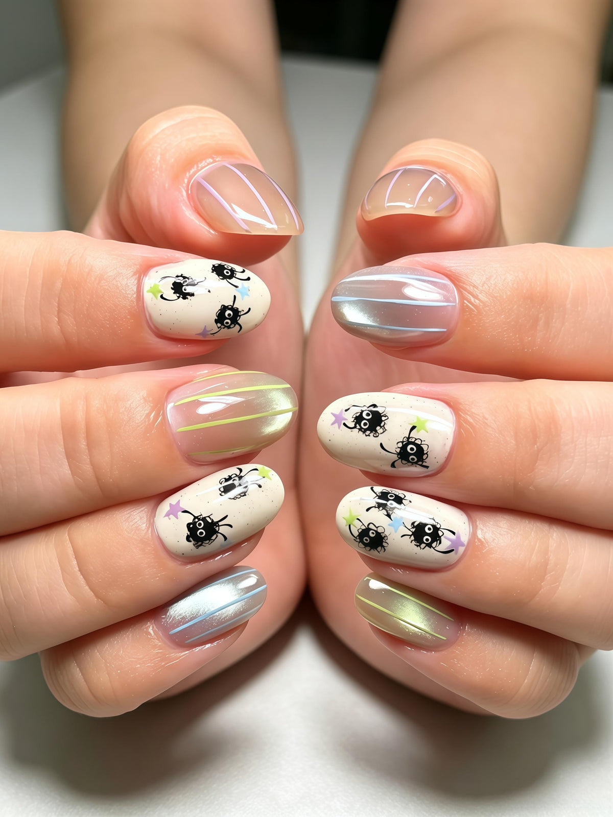 Soot Sprite Press-On Nails With Iridescent Chrome and Painted Stars