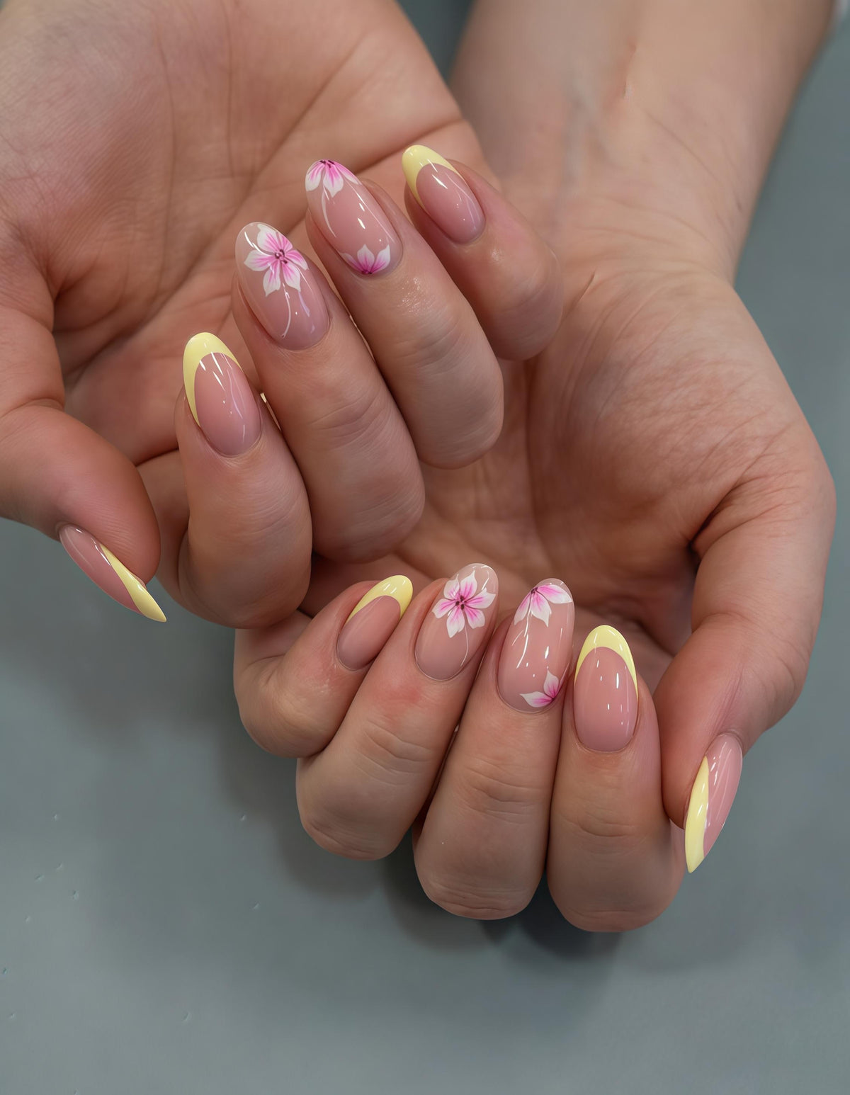 Spring Yellow French Tip Press-On Nails With Pink Daisy Floral Design