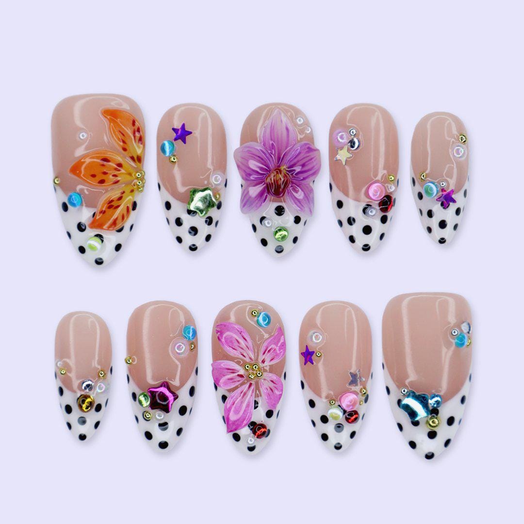 Summer Nude Pink Polka Dot French Tip Nails With Colorful Gems and Tropical Flowers