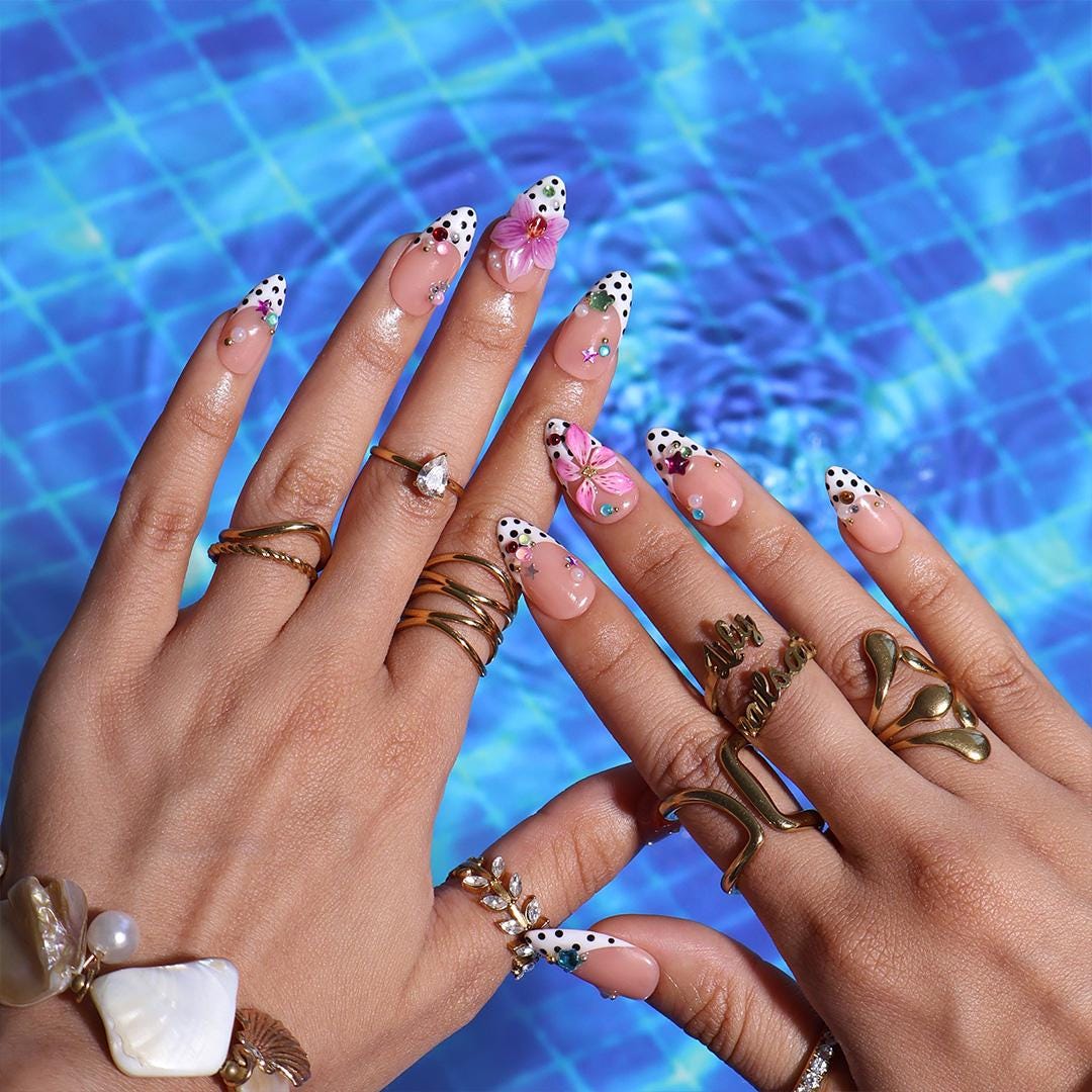 Summer Nude Pink Polka Dot French Tip Nails With Colorful Gems and Tropical Flowers