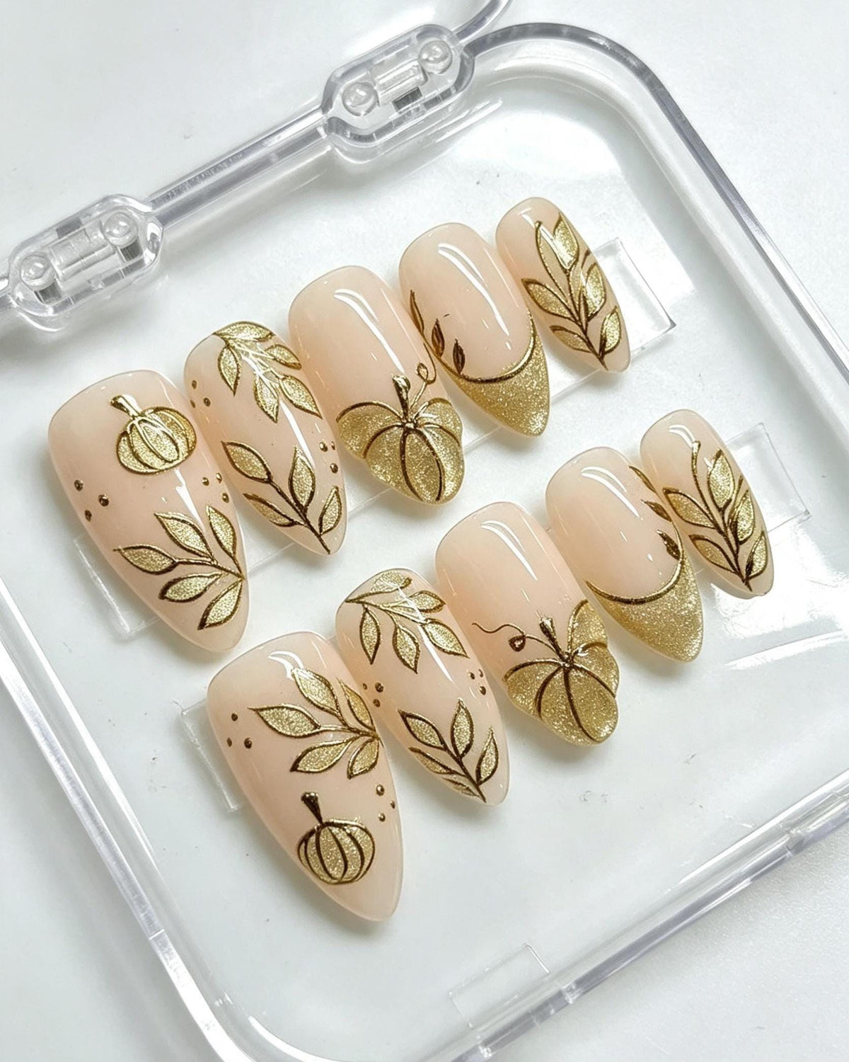 Thanksgiving Autumn Pumpkin Nails with Gold Glitter French Tips and Leaf Details