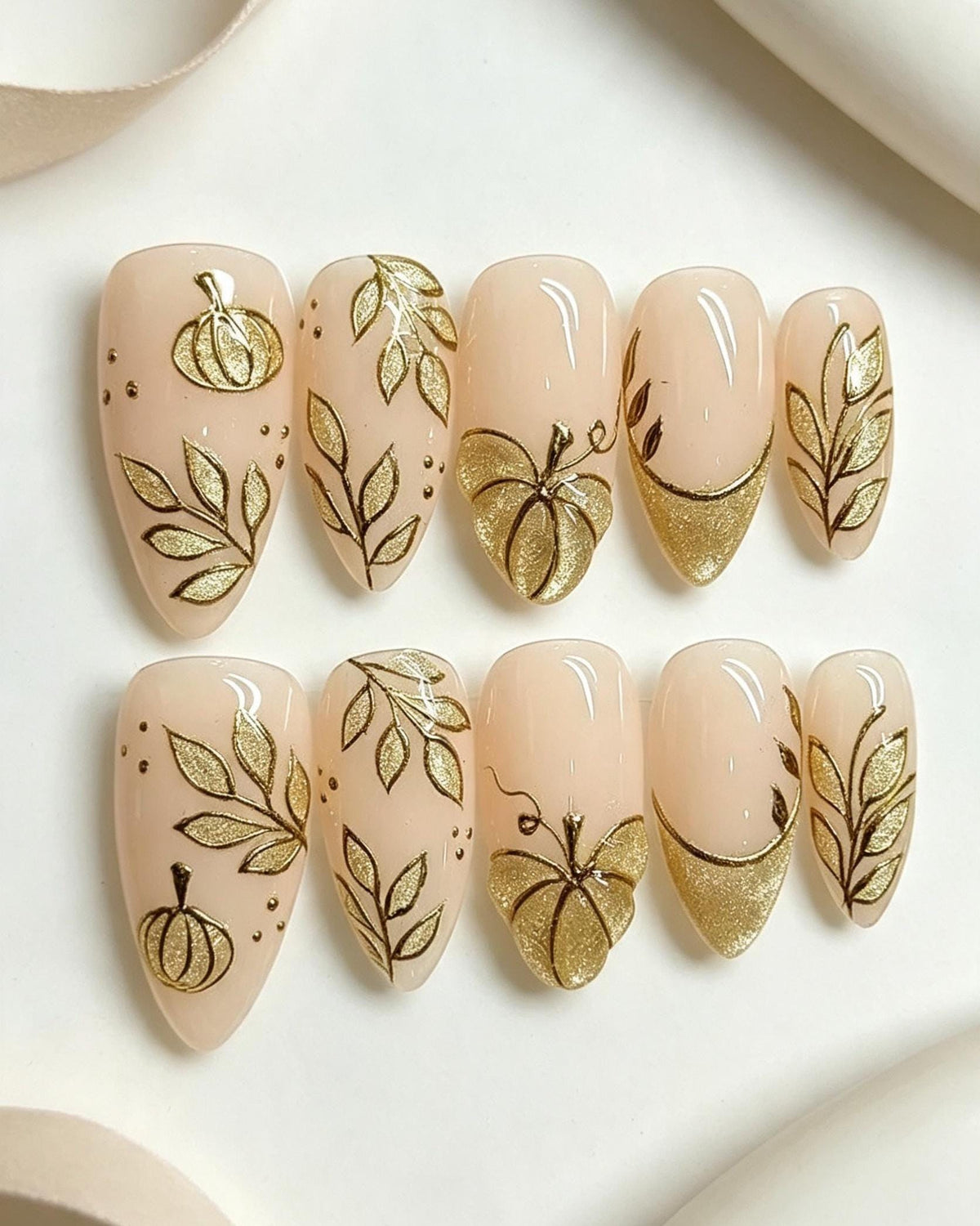 Thanksgiving Autumn Pumpkin Nails with Gold Glitter French Tips and Leaf Details