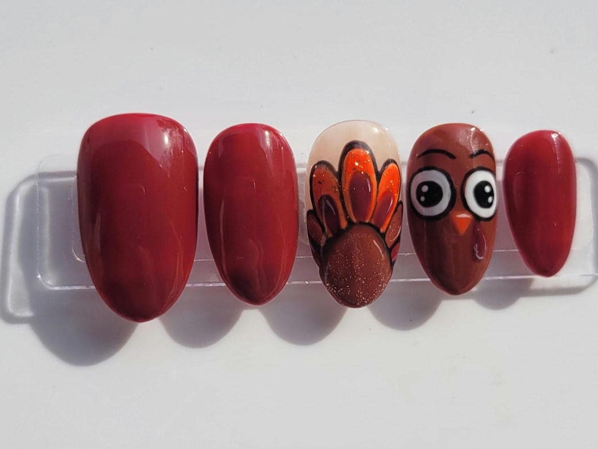 Thanksgiving Turkey Nails in Glossy Maroon with Painted Feather and Face Accents