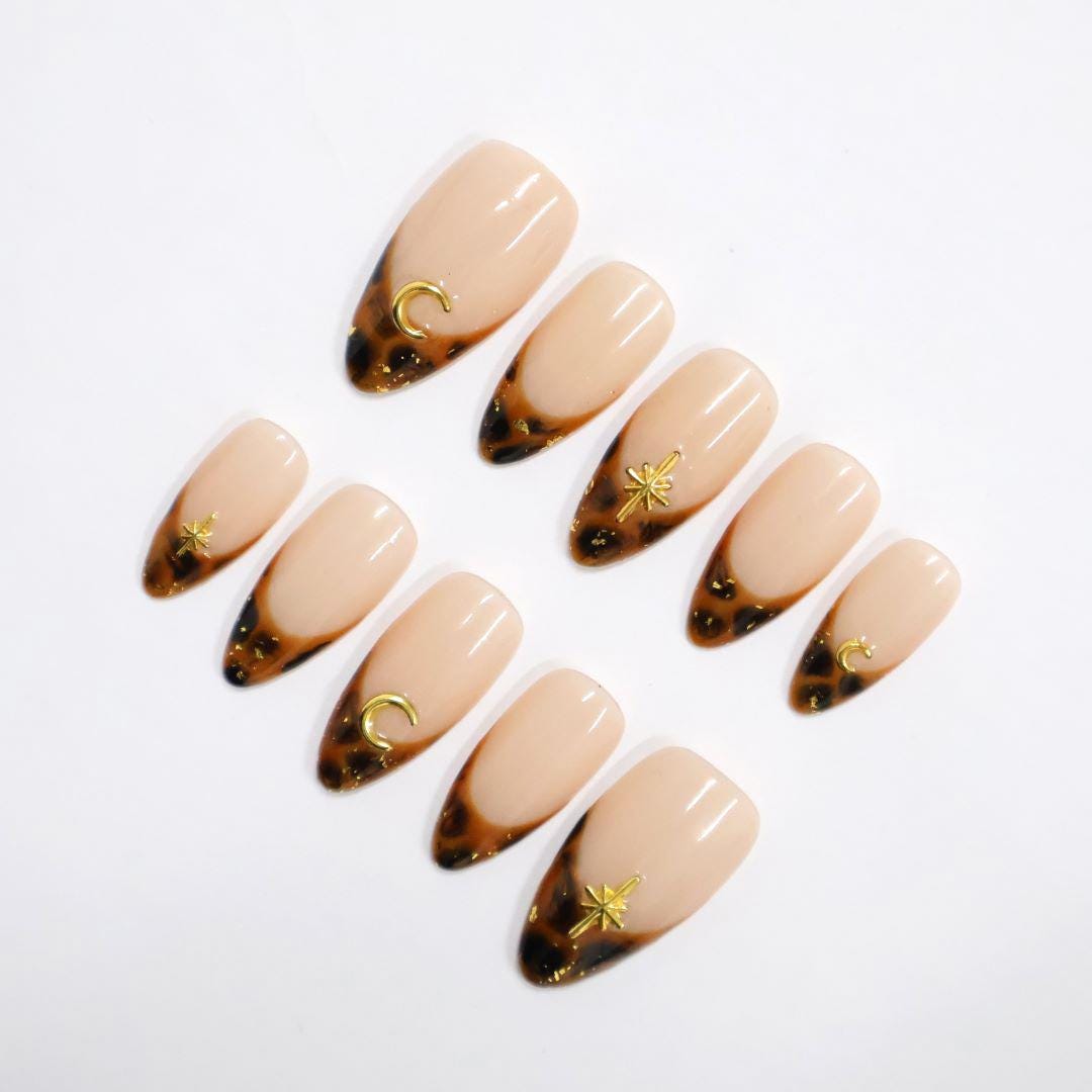 Tortoiseshell French Tip Press On Nails with Gold Moon and Starburst Charms
