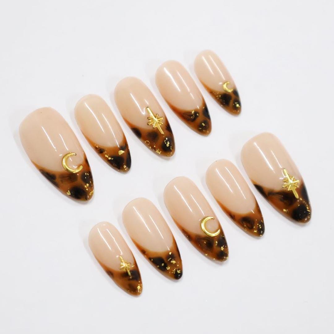 Tortoiseshell French Tip Press On Nails with Gold Moon and Starburst Charms