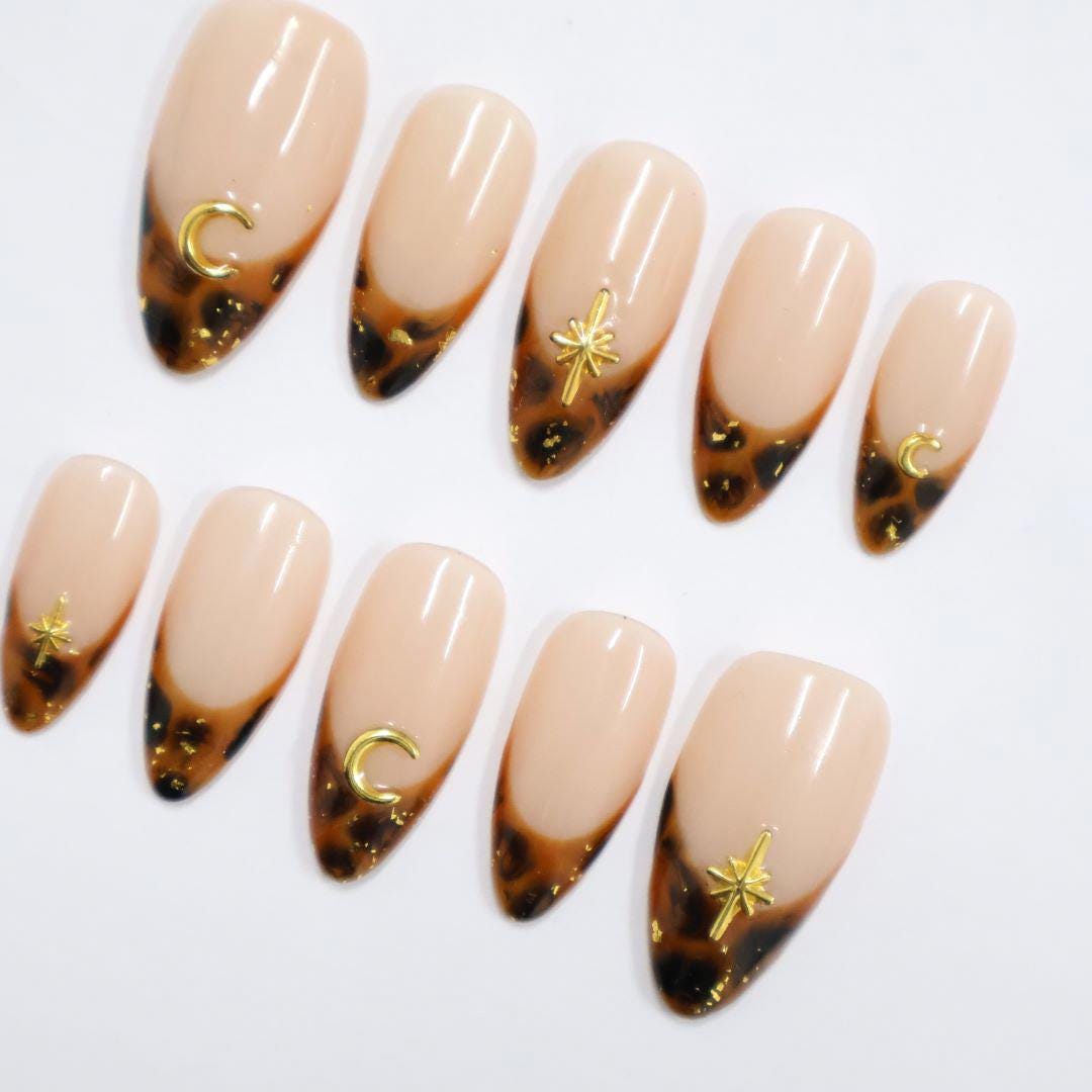 Tortoiseshell French Tip Press On Nails with Gold Moon and Starburst Charms