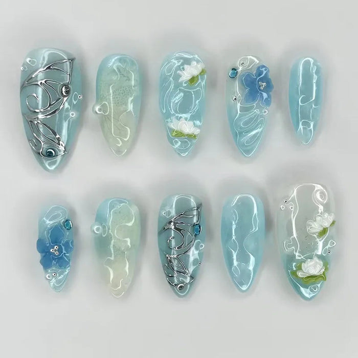 Translucent Aqua Floral Press On Nails With Silver Sculptural Details