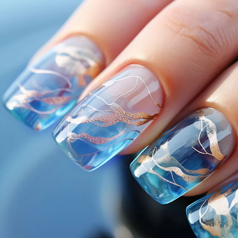 Translucent Blue and White Marble Press On Nails With Gold Wave Accents