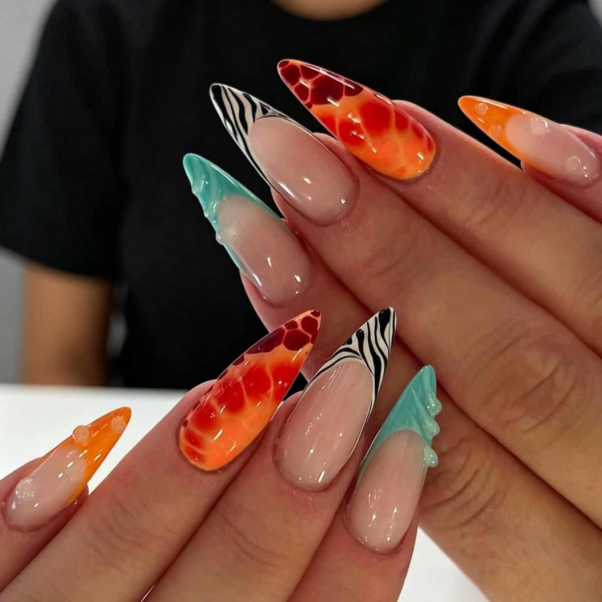 Tropical Mixed-Print Nails With Zebra Stripes and Coral Gradients