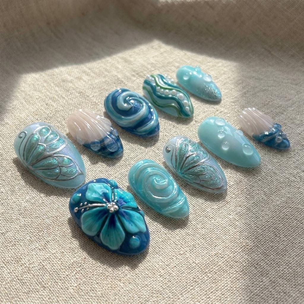 Turquoise Ocean Wave Press-On Nails With Sculpted Shell Details and Blue Flower