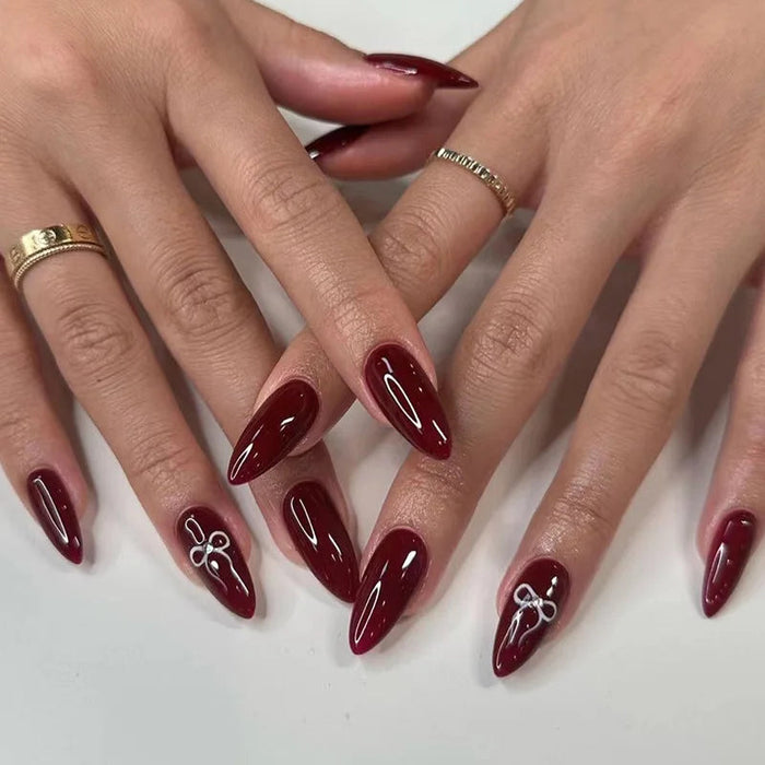Valentine's Day Glossy Burgundy Press On Nails With White Bow Accents