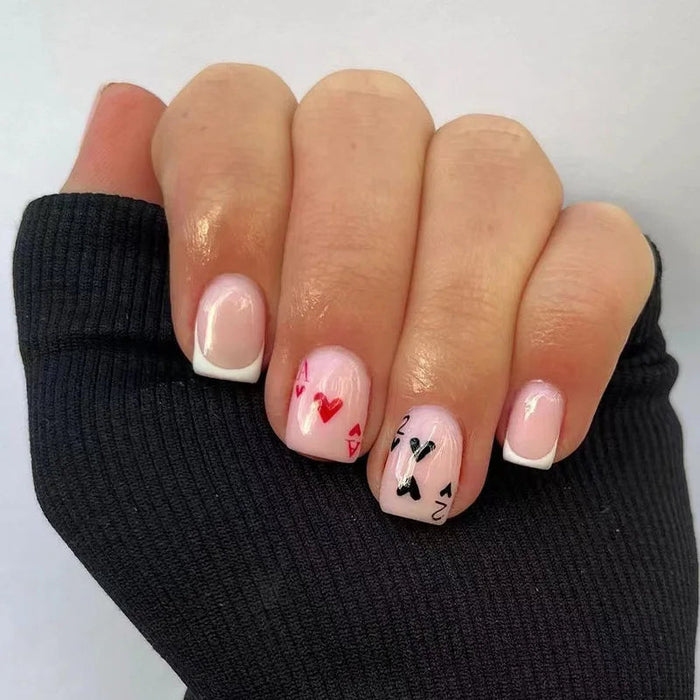 Valentine’s Day Pink French Tip Press-On Nails with Red Hearts and Playing Card Suits