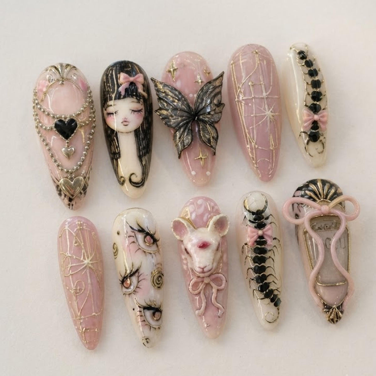 Whimsical Gothic Fantasy Press-On Nails With Pink, Gold, Portraits and Sculptural Details