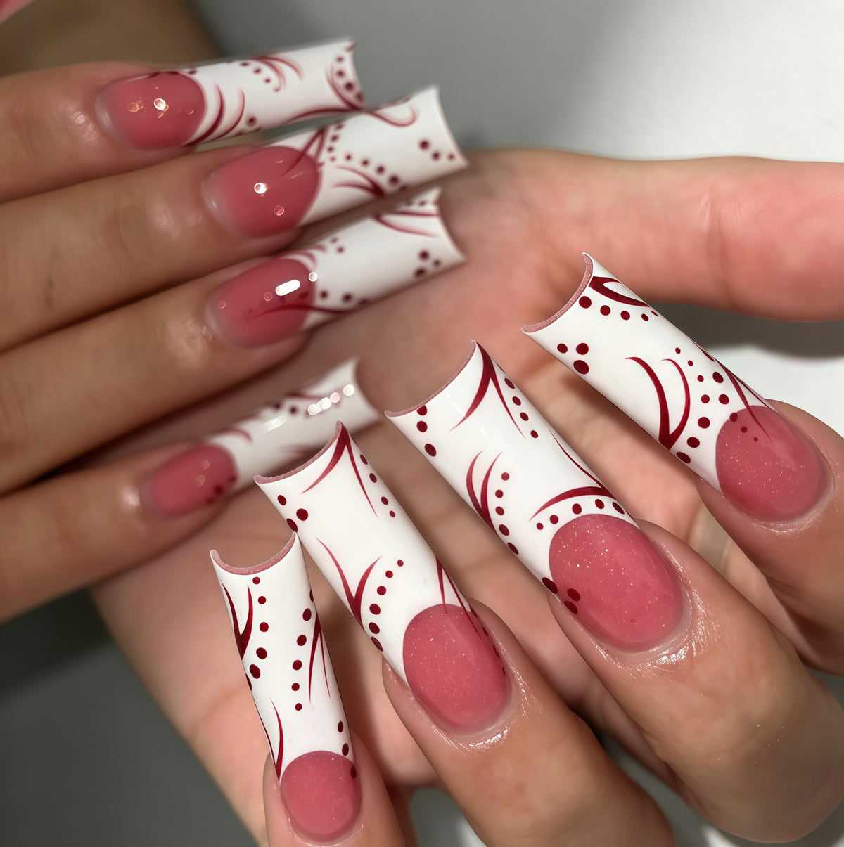 White and Dusty Rose Press On Nails With Burgundy Curves and Dots