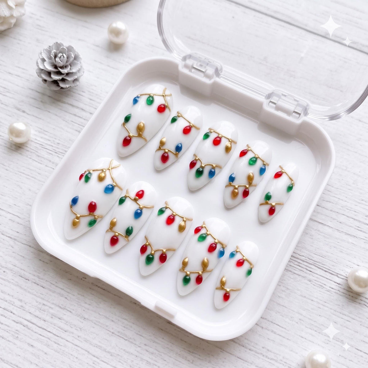 White Christmas Light Nail Set With Colorful Bulbs and Gold Wire