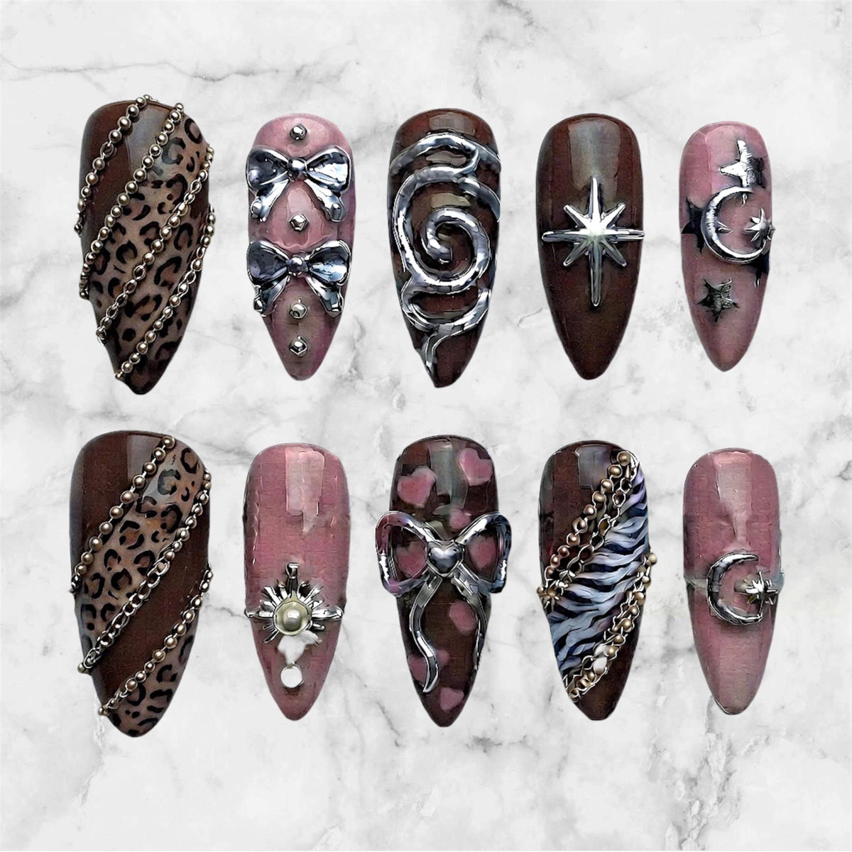 Y2K Brown and Pink Leopard Print Nails with Silver Bows and Celestial Charms