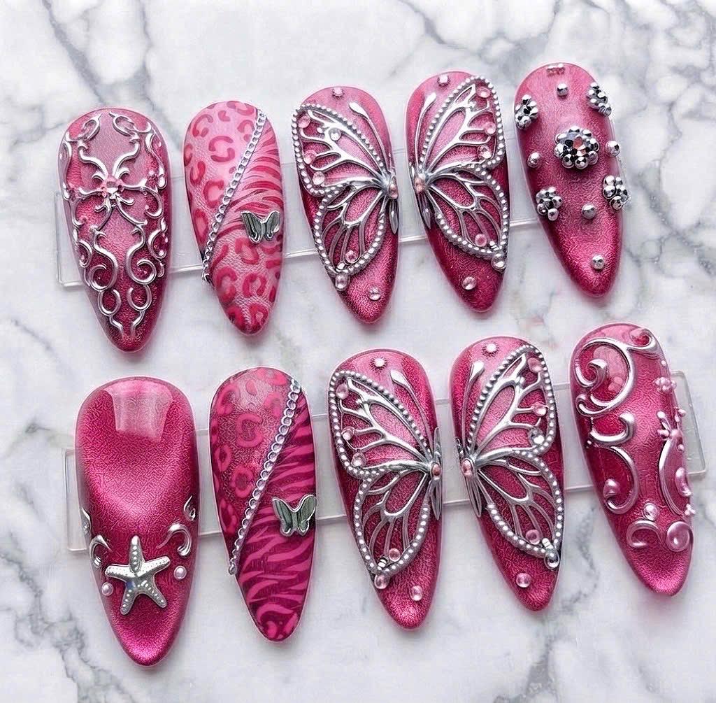 Y2K Cyberpunk Hot Pink Leopard Print Press On Nails with Silver Butterfly Wings and Rhinestones