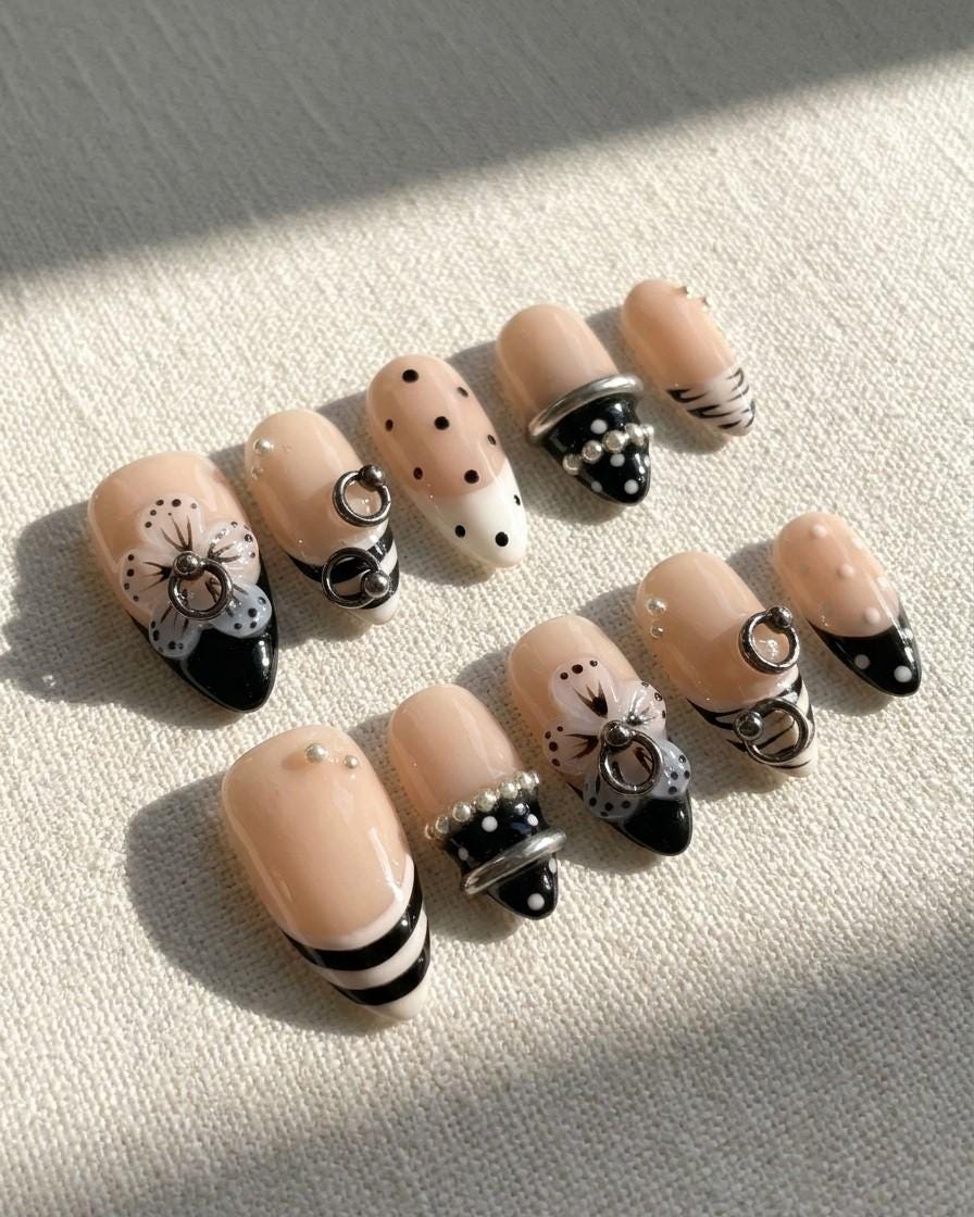 Y2K Grunge Nude Pink and Black 3D Flower Nails with Silver Rings and Pearl Accents