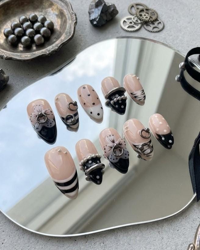 Y2K Grunge Nude Pink and Black 3D Flower Nails with Silver Rings and Pearl Accents