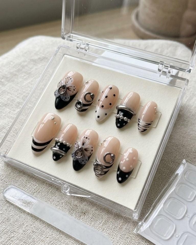Y2K Grunge Nude Pink and Black 3D Flower Nails with Silver Rings and Pearl Accents