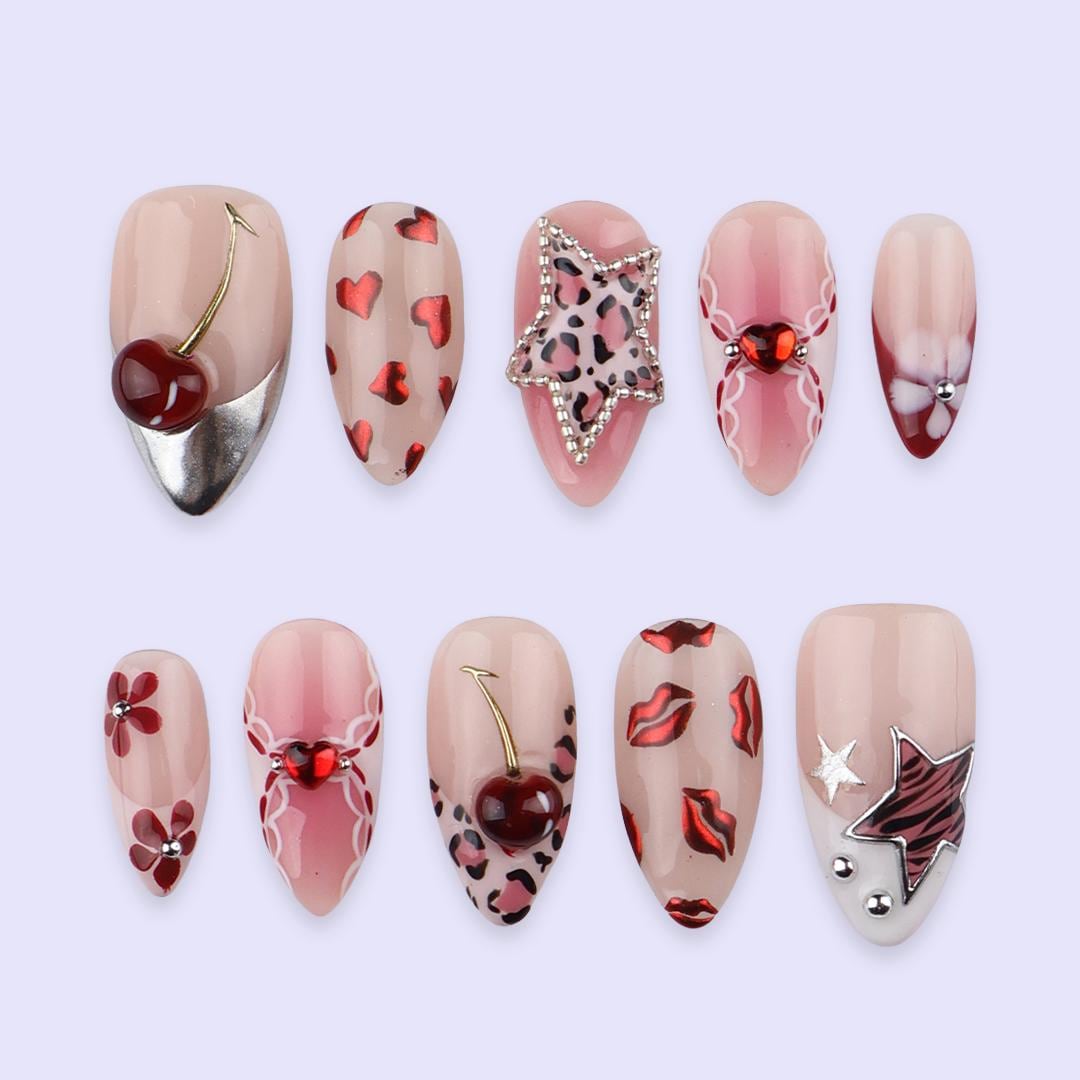 Y2K Valentine Nails With Leopard Spots, Rhinestone Star, Cherries and Chrome