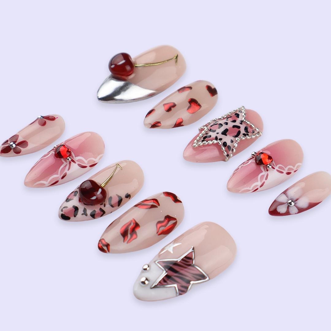 Y2K Valentine Nails With Leopard Spots, Rhinestone Star, Cherries and Chrome