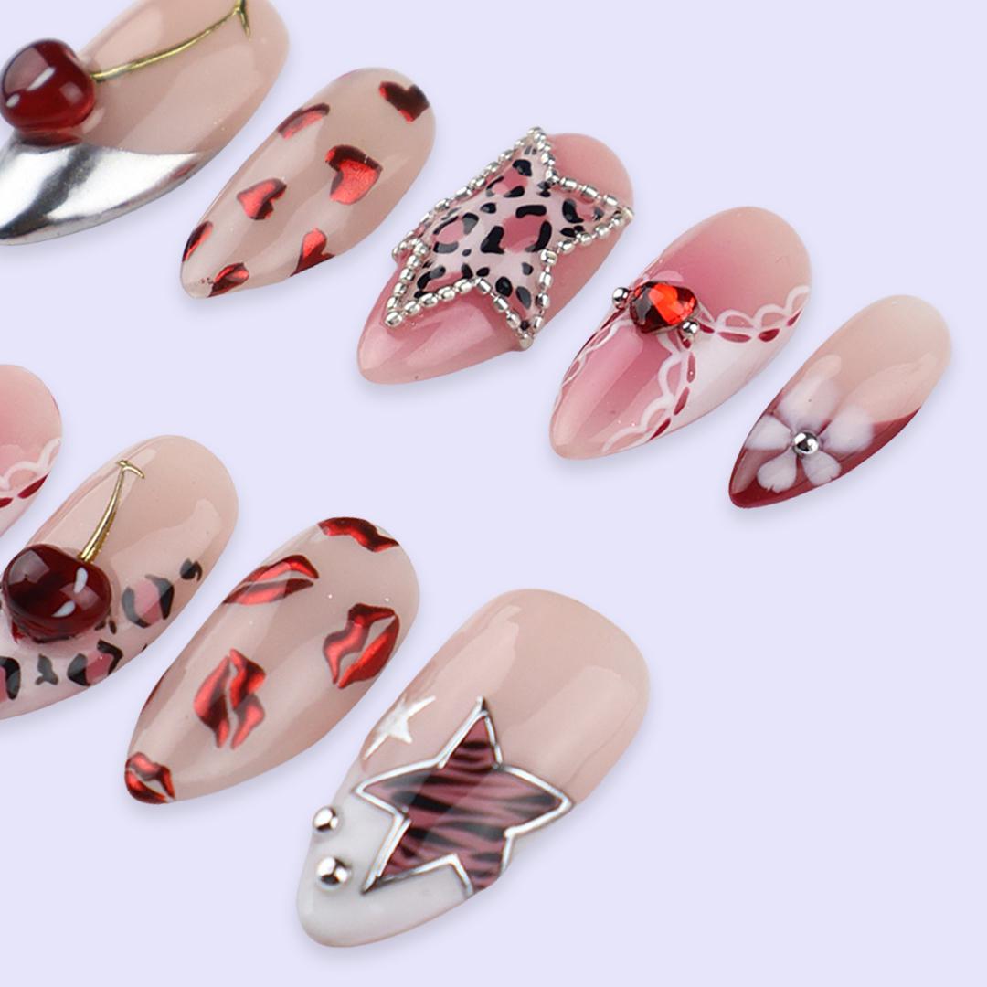 Y2K Valentine Nails With Leopard Spots, Rhinestone Star, Cherries and Chrome
